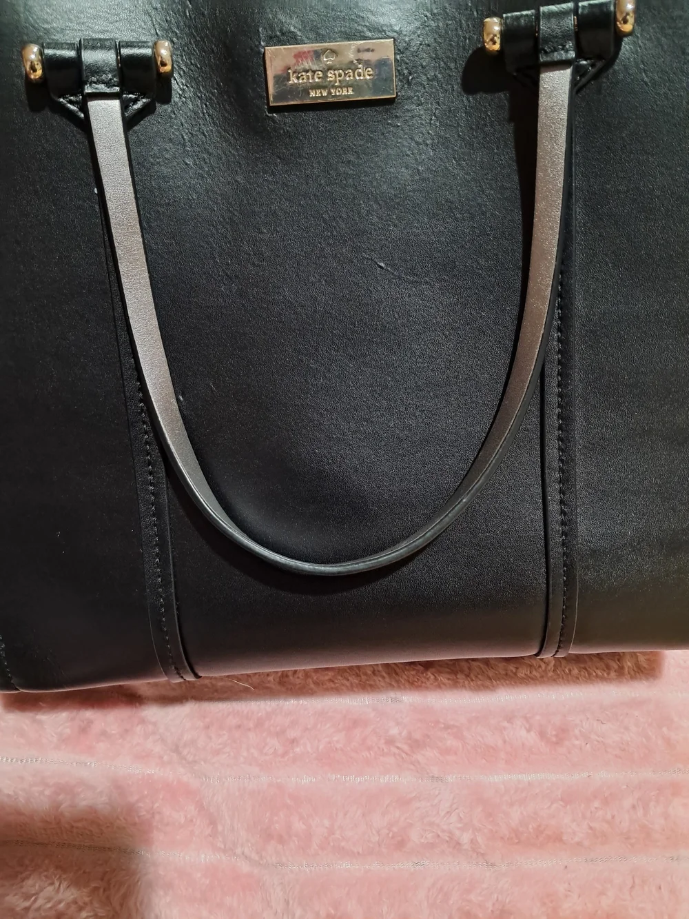 Kate Spade New York black leather tote bag with shoulder strap​